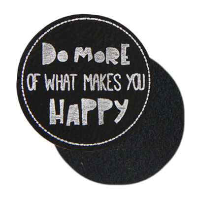 PREMIUM Leather labels, with the inscription "DO MORE OF WHAT MAKES YOU HAPPY"