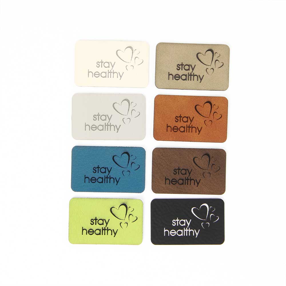 Synthetic leather labels, with the inscription "stay healthy"